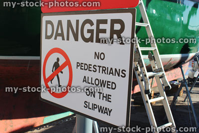 Stock image of danger sign / warning, no pedestrians allowed on slipway