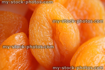Stock image of dried apricots / fruit, stoned apricot halves ready to eat