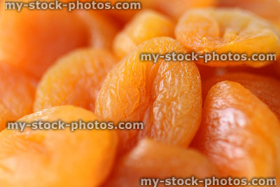 Stock image of dried apricots / fruit, stoned apricot halves ready to eat