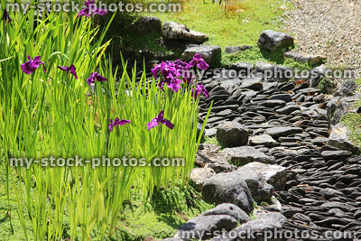 Stock image of dry river in Japanese garden with slate paddlestones