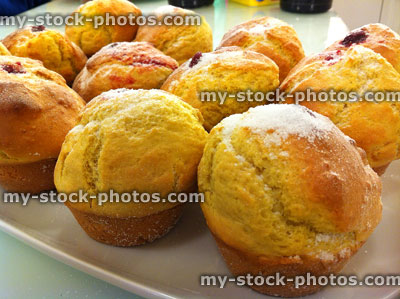 Stock image of plate of homemade muffins / duffins with jam, sugar