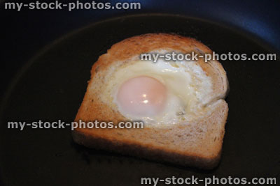 Stock image of egg in hole toast / fried bread with egg