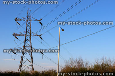 Stock image of high voltage electricity pylon tower and wires, sky