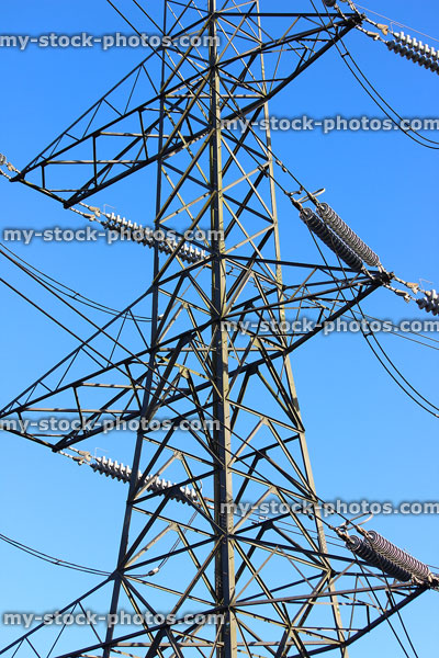 Stock image of electricity pylon / transmission tower, steel lattice cage, wires, insulators