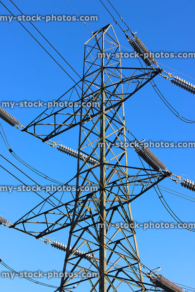 Stock image of steel lattice electricity pylon / transmission tower, cage, wires, insulators
