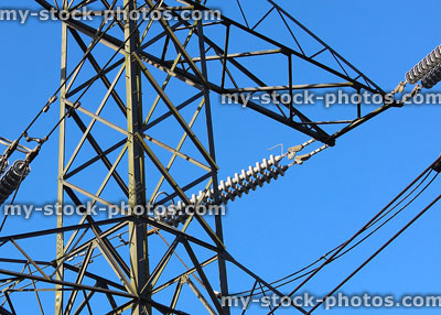 Stock image of electricity pylon / transmission tower, metal cage, wires, insulators
