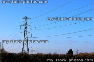 Stock image of double circuit electricity pylon / transmission tower, cage, wires, insulators