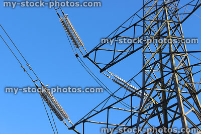 Stock image of electricity pylon / transmission tower, cage, wires, insulators, side view, crossarms