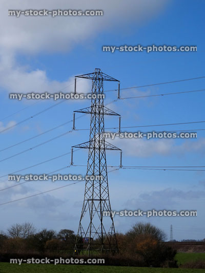 Stock image of electricity pylon / transmission tower, cage, wires, insulators, whole tower