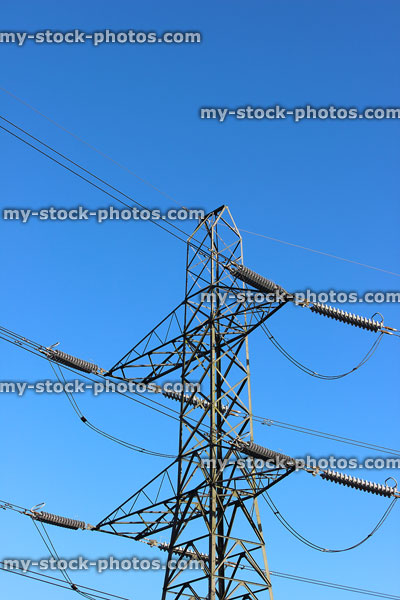 Stock image of electricity pylon / transmission tower, cage, wires, insulators, sky