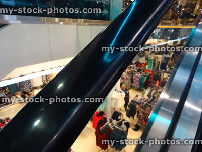 Stock image of department store escalator handrail / rail, germs, cold, flu virus, shopping mall