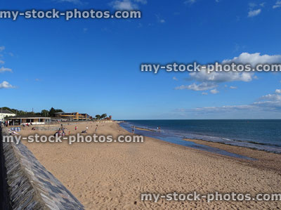 Stock image of holidaymakers on sandy beach, Exmouth, Devon, England, UK