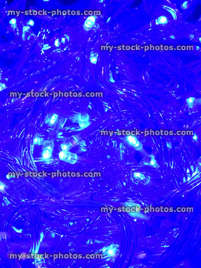 Stock image of tangled blue Christmas tree fairy lights, twinkling xmas lights