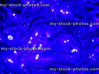 Stock image of tangled blue Christmas tree fairy lights, twinkling xmas lights
