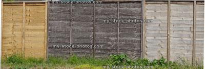 Stock image of fence panel banner, different colours / ages of wood