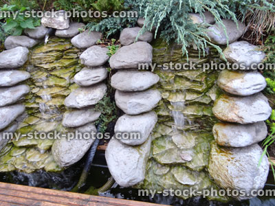 Stock image of realistic artificial moulded fibreglass waterfalls, grey stone, polyresin plastic waterfall