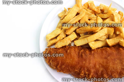 Stock image of battered fish and chips on a white plate (close up)