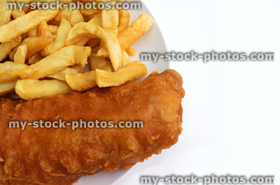 Stock image of battered fish and chips on a white plate (close up)