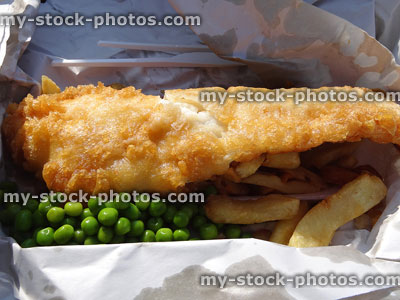 Stock image of 'healthy' fish and chips, battered cod with garden peas