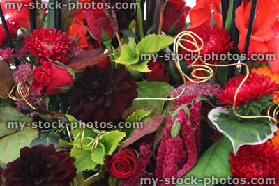 Stock image of modern flower display / floral arrangement, red roses, chrysanthemums