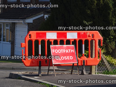 Stock image of 'Footpath Closed Sign' on pavement / road, resurfacing work