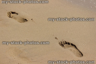 Stock image of footprints in sand, beach footprints at seaside