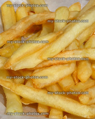 Stock image of pile of French fries / chips from burger bar takeaway