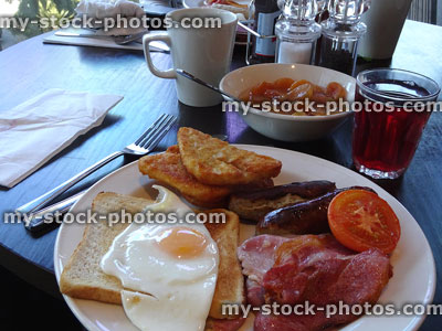 Stock image of table set for fried breakfast / traditional English fry up