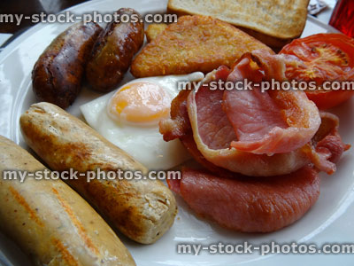 Stock image of classic English fried breakfast / fry up with vegetarian sausages