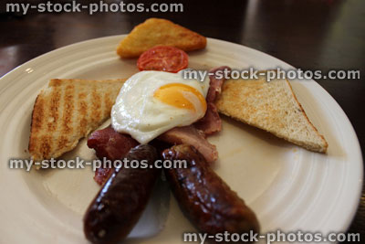 Stock image of fried breakfast man with sausage legs, children's food