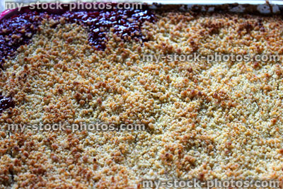 Stock image of homemade blackberry and apple crumble, freshly cooked, dish