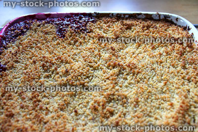 Stock image of homemade apple and blackberry crumble, freshly cooked, dish