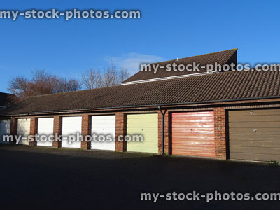 Stock image of private garages / garage block, painted up and over doors
