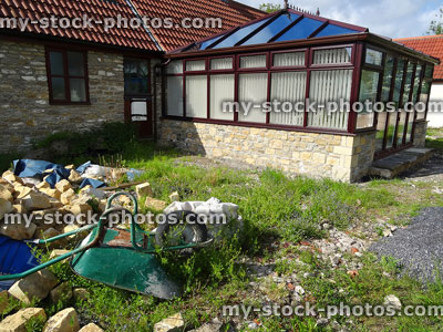 Stock image of bungalow with new brick, UPVC conservatory, glass roof