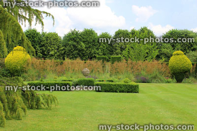 Stock image of landscaped knot garden with geometric clipped box hedges