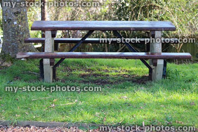 Stock image of concrete icnic table in park, weatherproof and theftproof