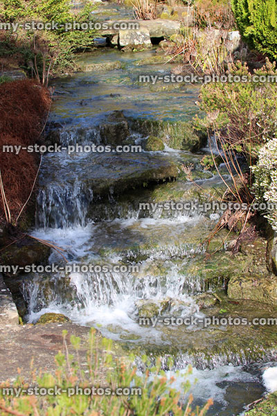 Stock image of stream cascade over rocks, rockery waterfall with limestone