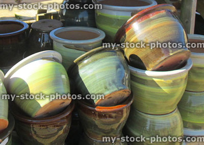 Stock image of green glazed stone / clay pots at garden centre