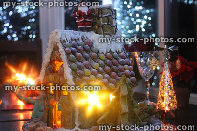 Stock image of gingerbread house at night with Christmas fairy lights