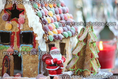 Stock image of homemade edible gingerbread house with Father Christmas / Santa