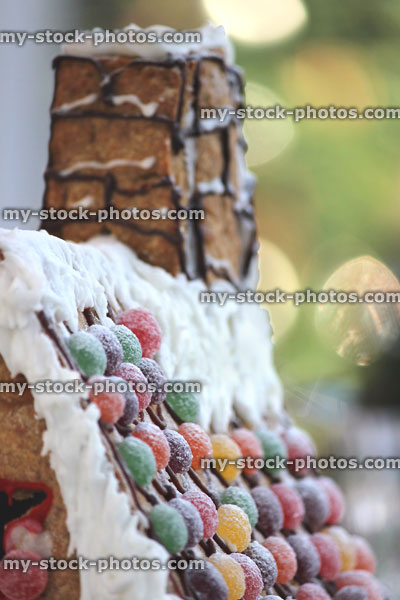 Stock image of chimney and roof on gingerbread house with sweets