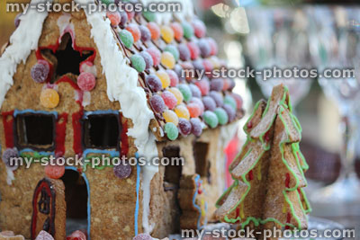 Stock image of gingerbread house with jelly sweets decorations and icing