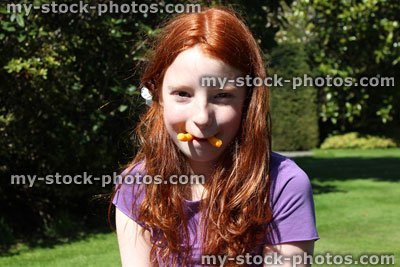 Stock image of funny girl pretending to be a walrus