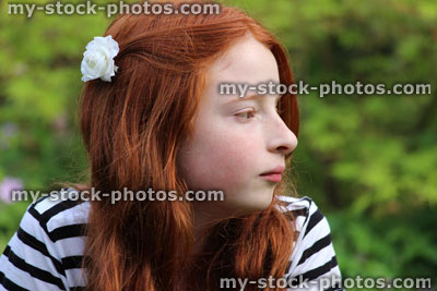 Stock image of girl looking into distance, side view of face
