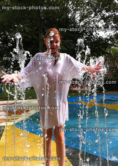 Stock image of young Girl Playing in a Fountain at a Splash Pad