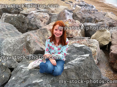 Stock image of Girl in Little Mermaid Pose on Rocks 