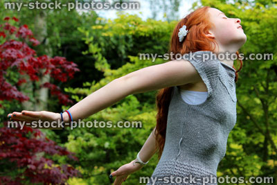 Stock image of beautiful young girl enjoying the sun in garden