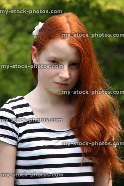 Stock image of cross girl, scowling and looking annoyed