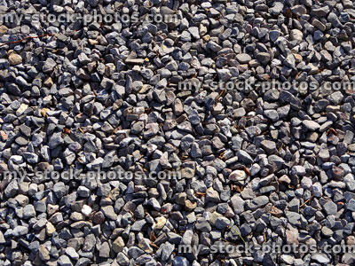 Stock image of medium grade grey gravel stones / grit, close up aggregate mulch