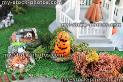 Stock image of model Halloween spooky town / village, miniature people, fall autumn, zombies, pumpkin heads